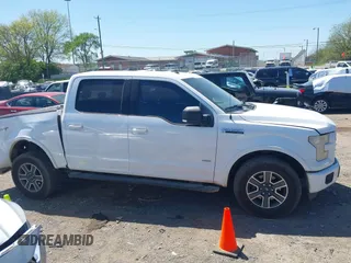 2015 Ford F-150 XL with VIN 1FTEW1CP5FKE17727, listed as a IAAI auction lot 42038024 with 142,441 mi miles. Bid and sale history available at carsss.com. Image 13.