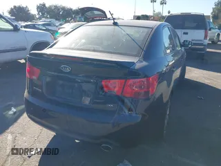 2012 Kia Forte SX with VIN KNAFW4A32C5623357, listed as a IAAI auction lot 41324098 with 217,354 mi miles. Bid and sale history available at carsss.com. Image 4.