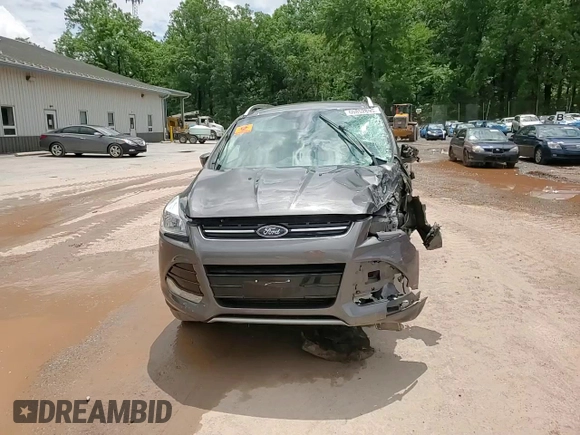 2015 Ford Escape Titanium with VIN 1FMCU9J93FUC86300, listed as a Copart auction lot 60852895 with 156,296 mi miles and Salvage title. Bid and sale history available at DreamBid. Image 14.