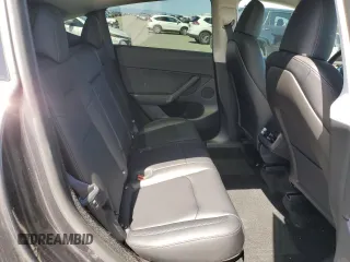 2025 Tesla Model Y Long Range with VIN 7SAYGDED4SF240354, listed as a Copart auction lot 52049745 with 6,785 mi miles and Salvage Title. Bid and sale history available at DreamBid. Image 10.