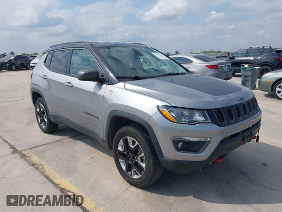 2018 Jeep Compass Trailhawk z VIN 3C4NJDDB5JT451192, wystawiony jako IAAI lot #42378382 z przebiegiem 132 667 mil mil oraz . Historia ofert i sprzedaży dostępna na DreamBid. Obrazek 1.