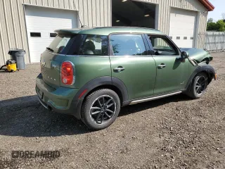 2015 MINI Countryman S with VIN WMWZC5C53FWP49039, listed as a Copart auction lot 60200335 with Not provided miles and Salvage title. Bid and sale history available at DreamBid. Image 3.