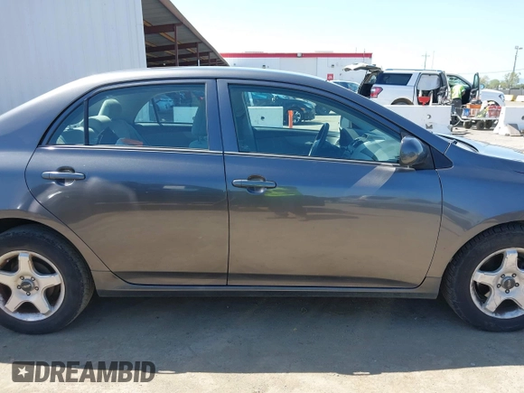 2012 Toyota Corolla L with VIN 5YFBU4EEXCP054988, listed as a IAAI auction lot 41973361 with 193,390 mi miles. Bid and sale history available at carsss.com. Image 13.