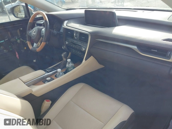 2017 Lexus RX 350 z VIN 2T2ZZMCA8HC060632, wystawiony jako IAAI lot #41334535 z przebiegiem 41 592 mil mil oraz . Historia ofert i sprzedaży dostępna na DreamBid. Obrazek 5.