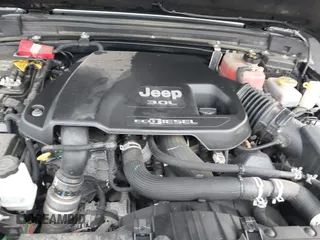 2021 Jeep Wrangler Unlimited Willys z VIN 1C4HJXDM5MW859724, wystawiony jako IAAI lot #42311203 z przebiegiem 71 887 mil mil oraz . Historia ofert i sprzedaży dostępna na DreamBid. Obrazek 10.