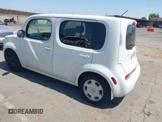 2013 Nissan Cube SL z VIN JN8AZ2KR5DT300935, wystawiony jako IAAI lot #42404264 z przebiegiem 119 808 mil mil oraz . Historia ofert i sprzedaży dostępna na DreamBid. Obrazek 3.