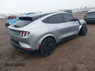 2021 Ford Mustang Mach-E GT z VIN 3FMTK4SE1MME00154, wystawiony jako IAAI lot #41536548 z przebiegiem 19 568 mil mil oraz . Historia ofert i sprzedaży dostępna na DreamBid. Obrazek 4.