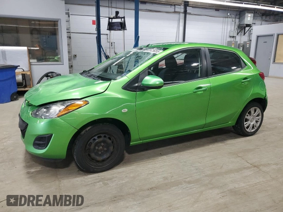 2012 Mazda 2 Sport with VIN JM1DE1KY9C0151578, listed as a Copart auction lot 52625055 with 123,812 mi miles and Salvage Title. Bid and sale history available at DreamBid. Image 1.