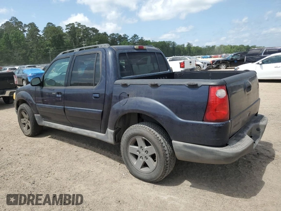 2002 Ford Explorer Sport Trac Value with VIN 1FMZU67E32UB56878, listed as a Copart auction lot 57154105 with 235,328 mi miles and Clean title. Bid and sale history available at DreamBid. Image 2.