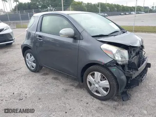 2014 Scion iQ with VIN JTNJJXB03EJ030212, listed as a IAAI auction lot 41091281 with 78,667 mi miles. Bid and sale history available at carsss.com. Image 1.