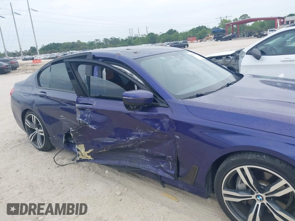 2018 BMW 7 Series 740i with VIN WBA7E2C58JB216314, listed as a IAAI auction lot 41867480 with 62,678 mi miles. Bid and sale history available at carsss.com. Image 6.