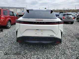2024 Lexus RZ 450e Premium с VIN JTJAAAAB6RA024377, выставлен на аукционе Copart как лот 52694095 с пробегом 20 872 миль миль и Списание • Salvage title. История ставок и продаж доступна на DreamBid. Изображение 6.