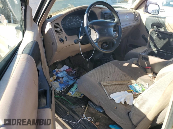 1999 Mazda B-Series Truck SX z VIN 4F4YR12C1XTM39102, wystawiony jako Copart lot #83462634 z przebiegiem 241 380 mil mil oraz Szkoda całkowita • Salvage title. Historia ofert i sprzedaży dostępna na DreamBid. Obrazek 8.