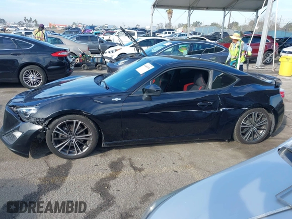 2013 Scion FR-S with VIN JF1ZNAA15D1722382, listed as a IAAI auction lot 41483974 with 108,427 mi miles. Bid and sale history available at carsss.com. Image 14.