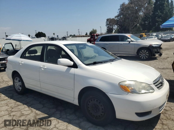 2003 Toyota Corolla CE with VIN JTDBR32E130042562, listed as a Copart auction lot 54989255 with 240,798 mi miles and Clean Title. Bid and sale history available at DreamBid. Image 4.