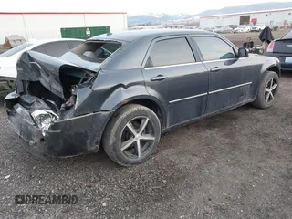 2007 Chrysler 300 Touring with VIN 2C3LK53G27H882957, listed as a IAAI auction lot 41350117 with 214,055 mi miles. Bid and sale history available at carsss.com. Image 4.