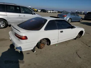 1992 Acura Integra with VIN JH4DA9357NS001599, listed as a Copart auction lot 83796424 with 188,218 mi miles and Salvage title. Bid and sale history available at DreamBid. Image 3.