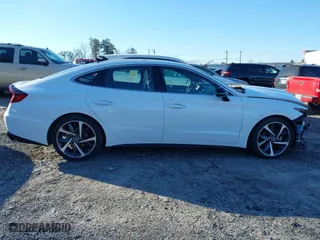2023 Hyundai Sonata SEL Plus with VIN KMHL44J27PA275714, listed as a IAAI auction lot 41590344 with 64,951 mi miles. Bid and sale history available at carsss.com. Image 13.