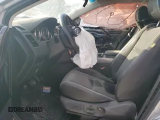 2015 Mazda CX-9 Grand Touring z VIN JM3TB2DA5F0468215, wystawiony jako Copart lot #53961975 z przebiegiem Nie podano mil oraz Szkoda całkowita • Salvage title. Historia ofert i sprzedaży dostępna na DreamBid. Obrazek 7.