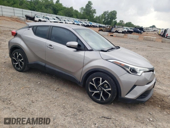 2018 Toyota C-HR XLE with VIN NMTKHMBX3JR013289, listed as a Copart auction lot 56950645 with 98,123 mi miles and Salvage title. Bid and sale history available at DreamBid. Image 4.