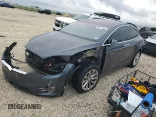 2017 Tesla Model X 90D with VIN 5YJXCBE26HF079246, listed as a Copart auction lot 50141605 with 68,905 mi miles and Salvage Title. Bid and sale history available at DreamBid. Image 1.