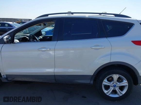 2013 Ford Escape SE with VIN 1FMCU0GX9DUB83638, listed as a IAAI auction lot 42471869 with 213,356 mi miles and . Bid and sale history available at DreamBid. Image 15.