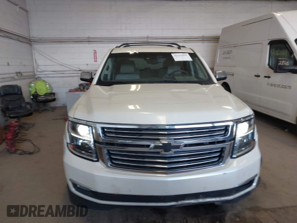 2015 Chevrolet Tahoe LTZ with VIN 1GNSKCKC9FR123996, listed as a IAAI auction lot 42113435 with 149,825 mi miles and . Bid and sale history available at DreamBid. Image 12.