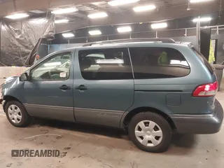 2003 Toyota Sienna CE with VIN 4T3ZF19C03U510244, listed as a IAAI auction lot 41441599 with 126,030 mi miles. Bid and sale history available at carsss.com. Image 14.
