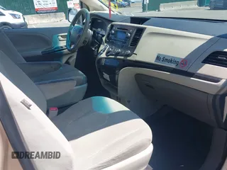 2014 Toyota Sienna L with VIN 5TDZK3DC9ES518653, listed as a IAAI auction lot 42767591 with 261,730 mi miles and . Bid and sale history available at DreamBid. Image 5.