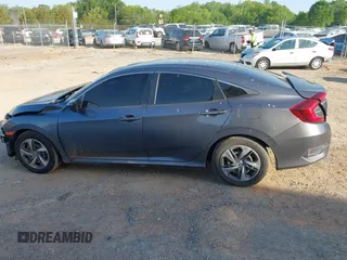 2020 Honda Civic LX with VIN 2HGFC2F67LH534381, listed as a IAAI auction lot 42056676 with 124,344 mi miles and . Bid and sale history available at DreamBid. Image 15.