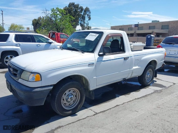 2003 Mazda B-Series 2WD Truck SX with VIN 4F4YR12D53TM11564, listed as a IAAI auction lot 42028399 with 218,402 mi miles. Bid and sale history available at carsss.com. Image 2.