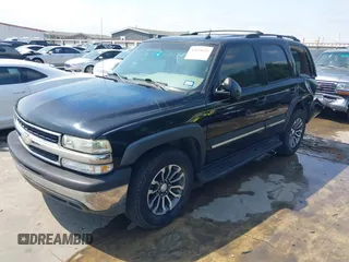 2004 Chevrolet Tahoe LS z VIN 1GNEC13Z04R248965, wystawiony jako IAAI lot #42031653 z przebiegiem 206 462 mil mil oraz . Historia ofert i sprzedaży dostępna na DreamBid. Obrazek 23.