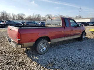 2002 Ford F-150 XL with VIN 1FTRX17W72NB29281, listed as a Copart auction lot 44590305 with 319,663 mi miles and Salvage Title. Bid and sale history available at carsss.com. Image 3.