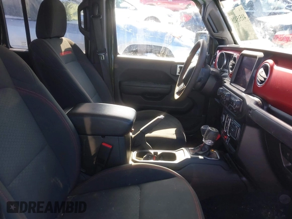 2023 Jeep Gladiator Rubicon with VIN 1C6JJTBG6PL576818, listed as a IAAI auction lot 41515428 with 10,271 mi miles and . Bid and sale history available at DreamBid. Image 5.