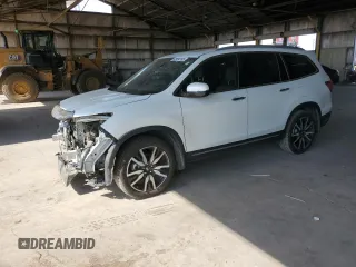 2021 Honda Pilot Touring 8-Passenger с VIN 5FNYF6H94MB047983, выставлен на аукционе Copart как лот 62934165 с пробегом 81 644 миль миль и Списание • Salvage title. История ставок и продаж доступна на DreamBid. Изображение 1.
