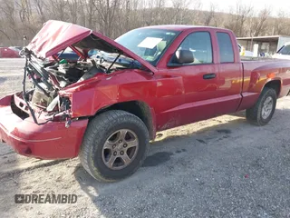 2006 Dodge Dakota SLT with VIN 1D7HW42N16S525329, listed as a IAAI auction lot 40920101 with 124,535 mi miles and . Bid and sale history available at carsss.com. Image 17.