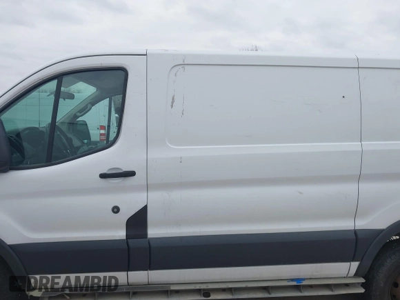 2015 Ford Transit Cargo with VIN 1FTNR1ZM0FKB02483, listed as a IAAI auction lot 41547400 with 317,720 mi miles and . Bid and sale history available at DreamBid. Image 12.