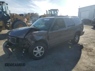 1998 Oldsmobile Bravada z VIN 1GHDT13W7W2702905, wystawiony jako Copart lot #77417944 z przebiegiem Nie podano mil oraz Nie do naprawy. Historia ofert i sprzedaży dostępna na DreamBid. Obrazek 1.