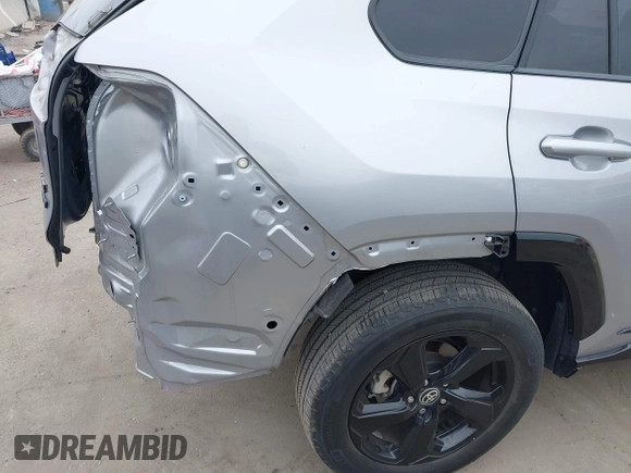 2021 Toyota RAV4 Hybrid XSE z VIN 4T3E6RFV9MU027713, wystawiony jako IAAI lot #42587759 z przebiegiem 28 806 mil mil oraz . Historia ofert i sprzedaży dostępna na DreamBid. Obrazek 21.