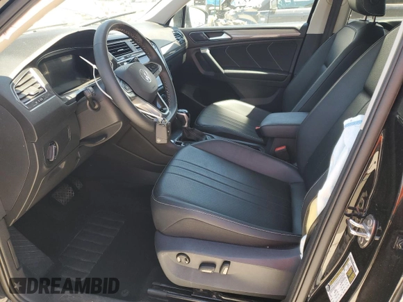 2024 Volkswagen Tiguan SE with VIN 3VV3B7AX8RM027356, listed as a Copart auction lot 56057415 with 33,197 mi miles and Salvage title. Bid and sale history available at DreamBid. Image 7.