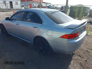 2004 Acura TSX with VIN JH4CL96844C030143, listed as a IAAI auction lot 42035820 with 216,588 mi miles. Bid and sale history available at carsss.com. Image 3.