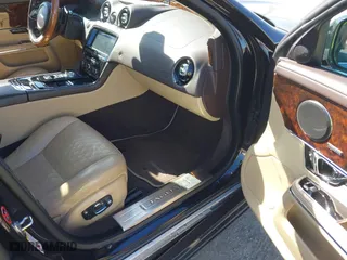 2018 Jaguar XJ with VIN SAJWJ2GD2J8W13463, listed as a IAAI auction lot 41897451 with 70,448 mi miles. Bid and sale history available at carsss.com. Image 5.