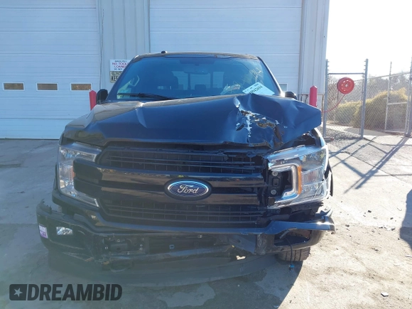 2018 Ford F-150 XL with VIN 1FTEW1EP7JFB77823, listed as a IAAI auction lot 40942694 with 163,078 mi miles. Bid and sale history available at carsss.com. Image 12.
