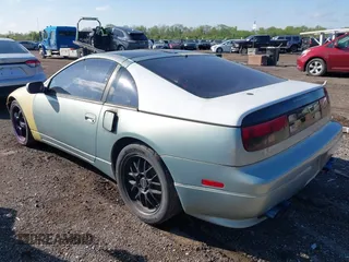 1990 Nissan 300ZX z VIN JN1RZ24A8LX017431, wystawiony jako IAAI lot #42226803 z przebiegiem 152 531 mil mil oraz . Historia ofert i sprzedaży dostępna na DreamBid. Obrazek 3.