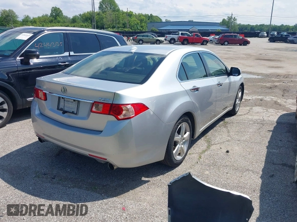 2012 Acura TSX with VIN JH4CU2F44CC016338, listed as a IAAI auction lot 42425648 with 129,090 mi miles and . Bid and sale history available at DreamBid. Image 4.