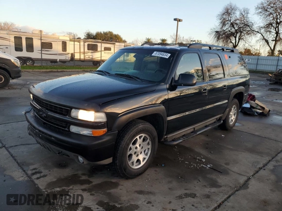 2001 Chevrolet Suburban LS z VIN 3GNFK16T91G221421, wystawiony jako Copart lot #87094634 z przebiegiem 186 977 mil mil oraz Szkoda całkowita • Salvage title. Historia ofert i sprzedaży dostępna na DreamBid. Obrazek 1.