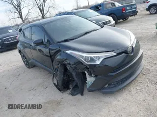 2018 Toyota C-HR XLE with VIN NMTKHMBX9JR001731, listed as a IAAI auction lot 41835918 with 138,087 mi miles. Bid and sale history available at carsss.com. Image 1.
