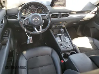 2017 Mazda CX-5 Touring z VIN JM3KFBCL4H0184922, wystawiony jako Copart lot #50166195 z przebiegiem 86 270 mil mil oraz Szkoda całkowita • Salvage title. Historia ofert i sprzedaży dostępna na DreamBid. Obrazek 8.