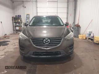 2016 Mazda CX-5 Grand Touring with VIN JM3KE4DY0G0732843, listed as a IAAI auction lot 41520889 with 149,798 mi miles. Bid and sale history available at carsss.com. Image 12.
