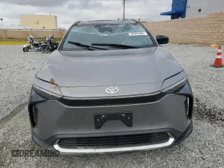 2024 Toyota bZ4X XLE with VIN JTMAAAAA8RA045760, listed as a Copart auction lot 50996385 with 3,833 mi miles and Salvage Title. Bid and sale history available at DreamBid. Image 5.